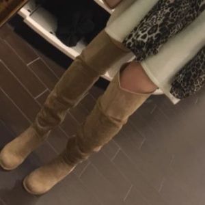 Over the knee high boots.